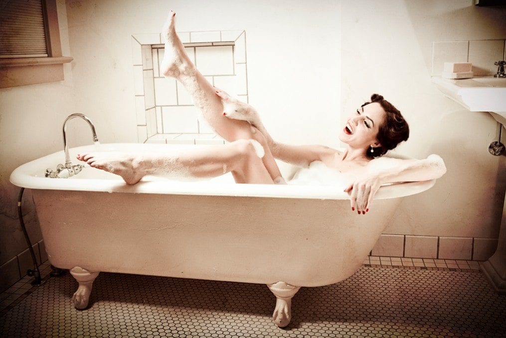 Woman having fun in bath