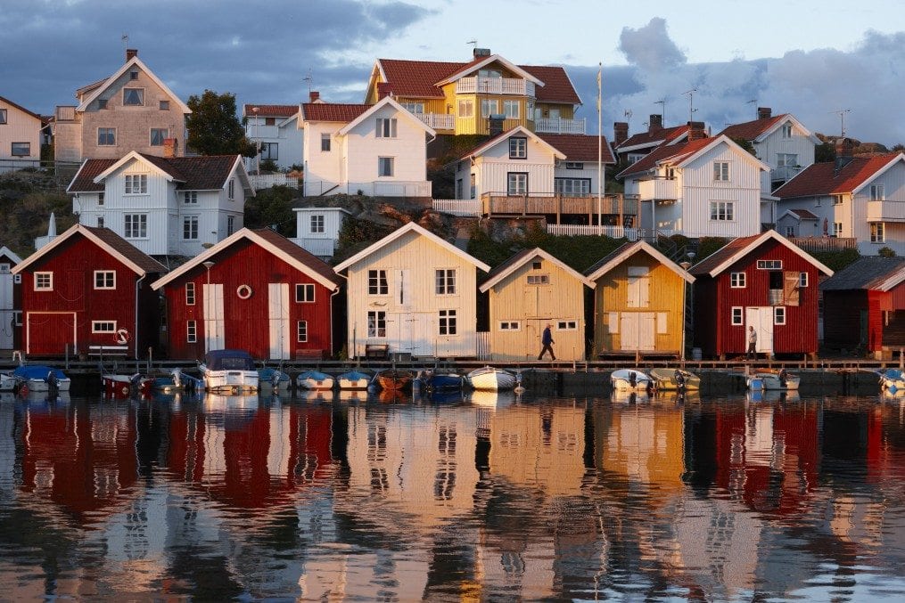 Houses by the sea at sunset, Sweden.