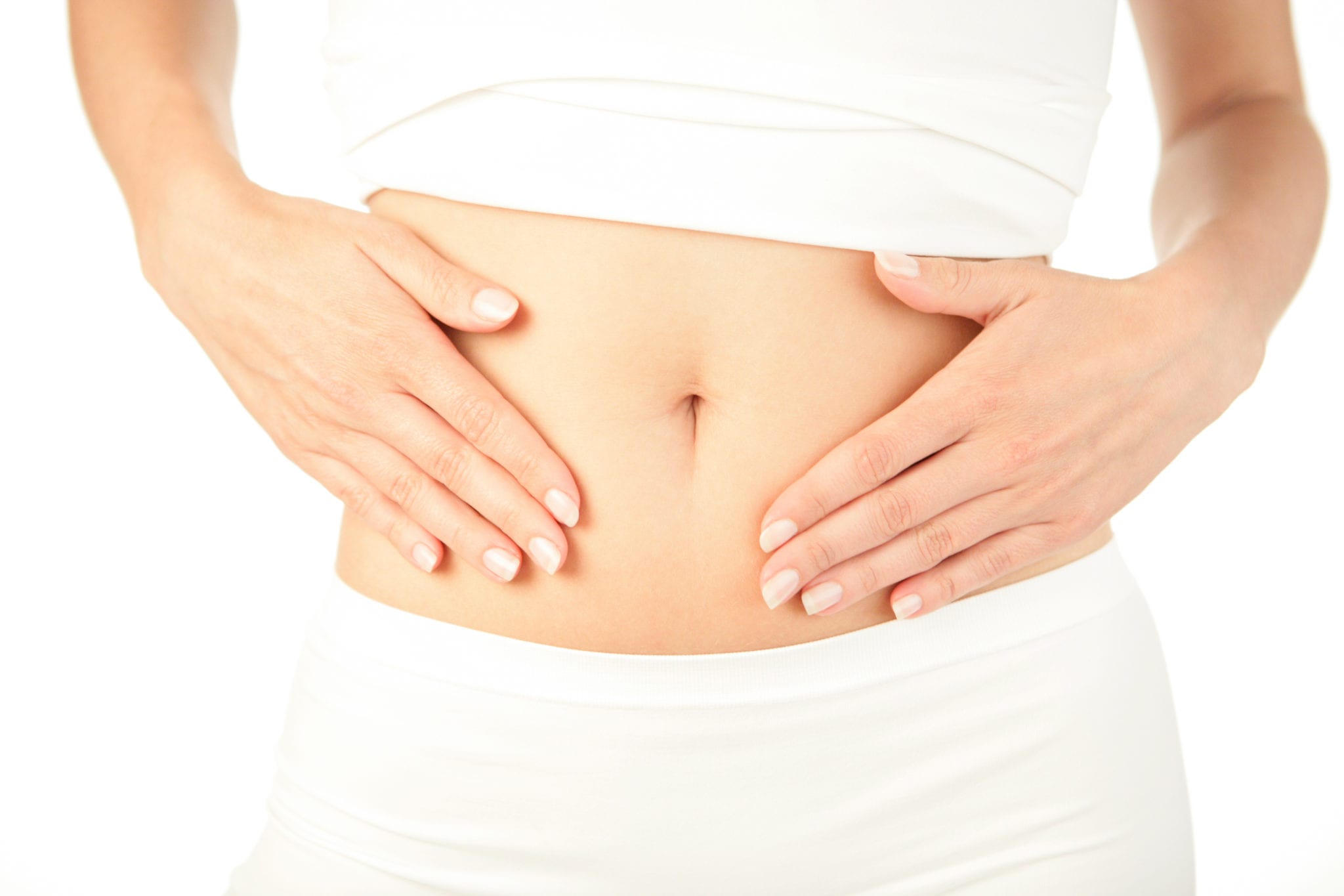 woman with palms on bare stomach