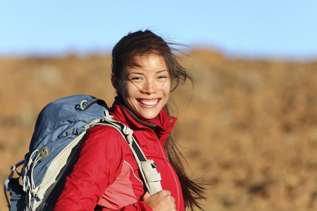 smiling woman hiking