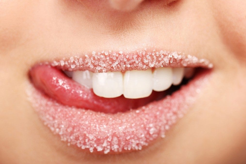 woman with sugar on her lips