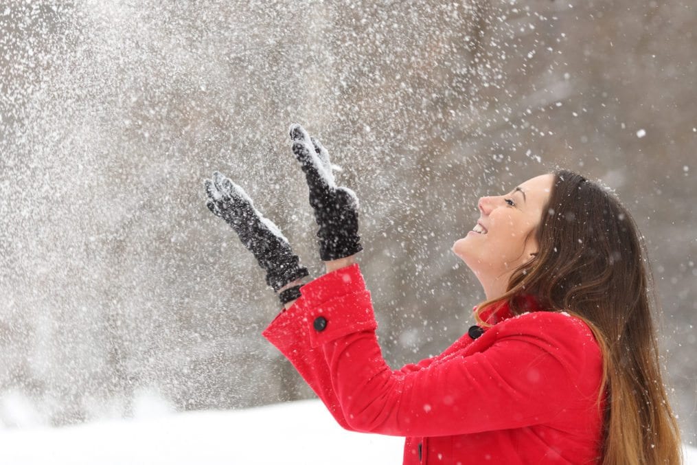woman enjoying the snow