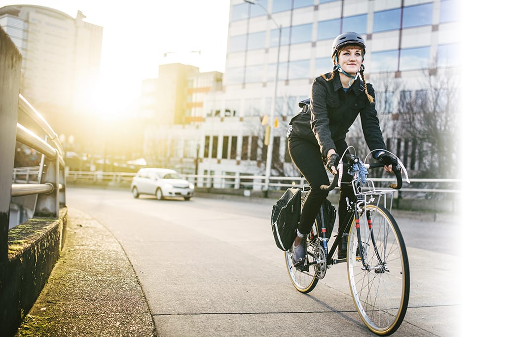 A woman commuting on an e-bike