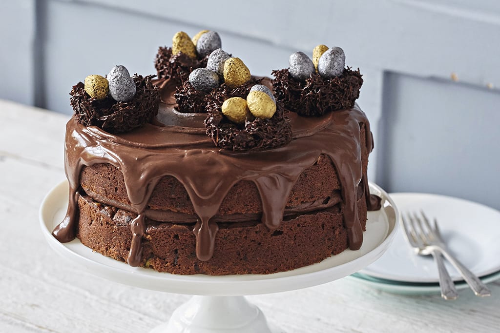 chocolate courgette easter cake decorated with chocolate nests and truffle eggs