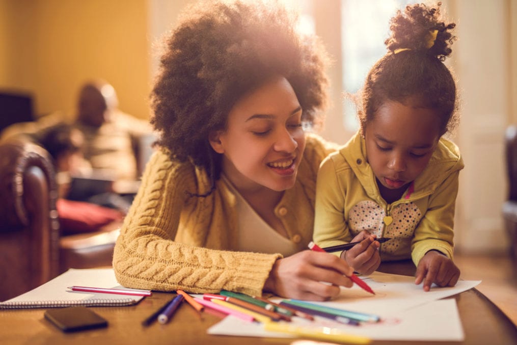 Mother and daughter creating art