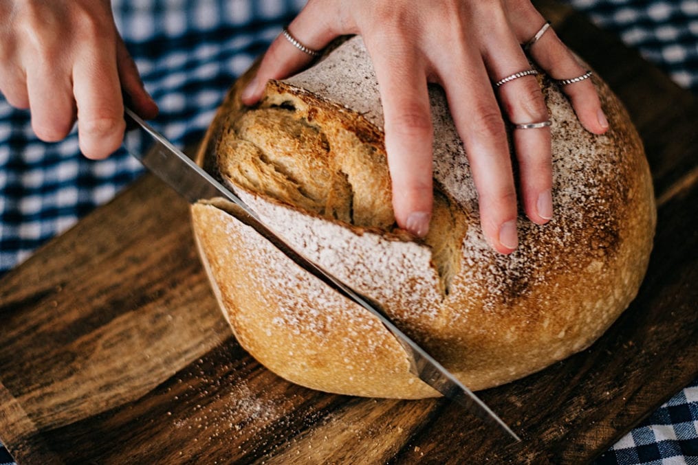 soudough bread being sliced