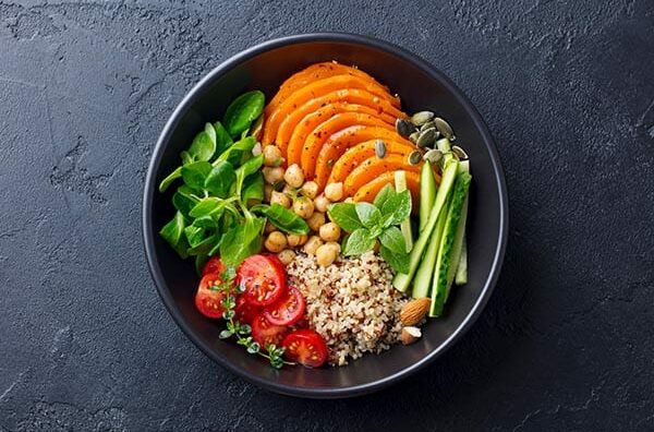 Plate with vegetables and other healthy foods