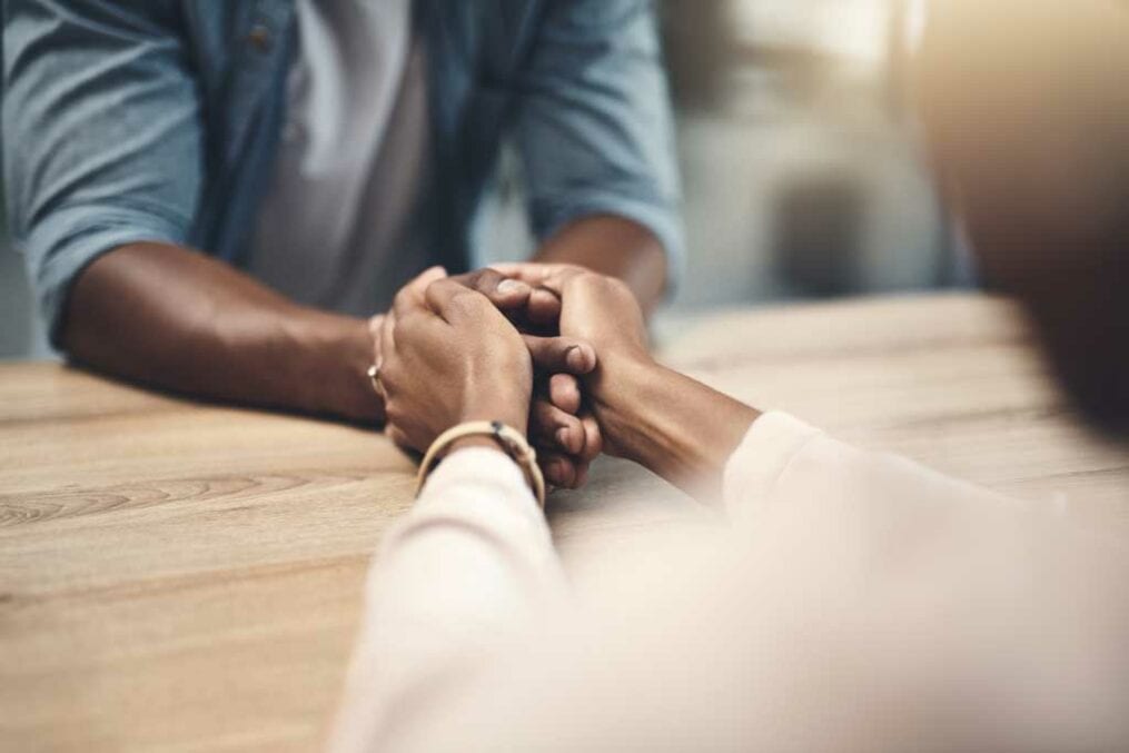 couple holding hands